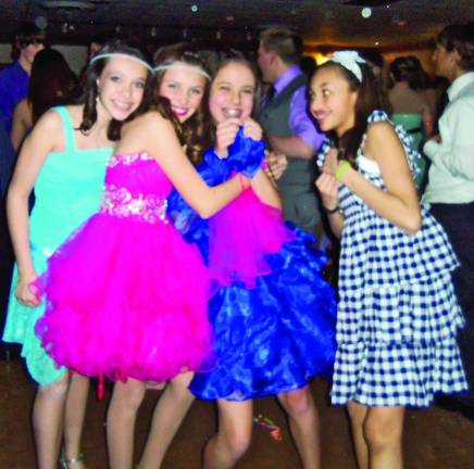 The girls had so much fun and looked beautiful in their fine dresses.
