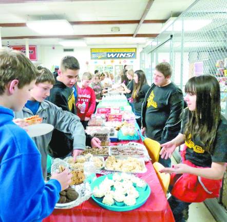 Super teams rock Macopin for Give a Goat Night