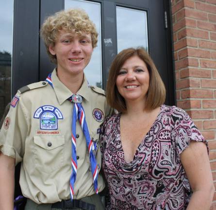 Patrick Kerssen with his mom, Lisa Kerssen, outside of the council meeting where he was honored by Mayor Bettina Bieri and the council.
