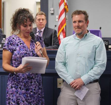Eli Easterbrook was named the township's Volunteer of the Year for 2016. Here he receives the award from Mayor Bettina Bieri. Easterbrook was instrumental in transitioning the former soccer league from the PAL to the township.