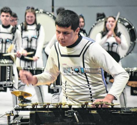 Members of the Highlander ensemble perform during the 2026 USBands Indoor Percussion New Jersey scholastic circuit kick-off event at West Milford High School, earning top score of 76.250 with its Stowaway’ theme on Saturday, Feb. 21.