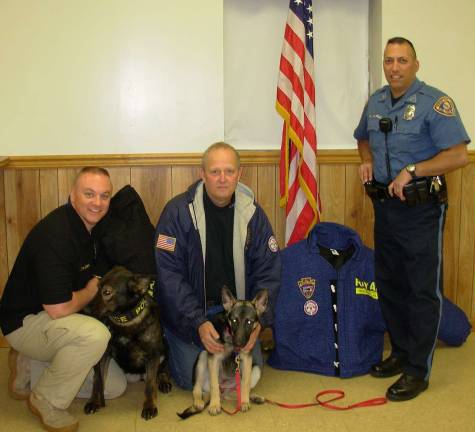 From left, Wanaque police Capt. Ken Fackina and his police dog, Zula, Frank Yevchak, founder of Support Our 4 Legged Soldiers, and his dog, Lucky, who is the new ambassador for the group, and Wanaque police Officer Jamie Cappello are supporters of the group that send much-needed supplies and gear to military working dogs in Afghanistan.