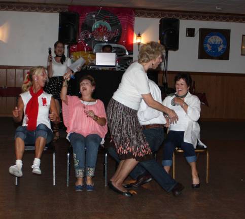 During musical chairs, the competition became fierce. You don't want to mess with this lady looking for that last chair!
