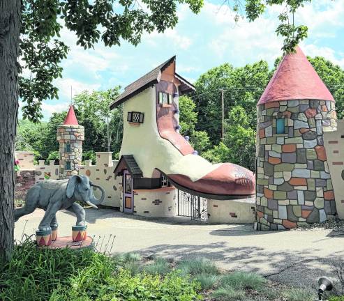 A gate based on “The Old Lady in the Shoe” is shown.