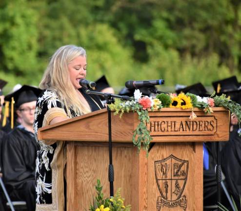 Kate Romeo, president of the Board of Education, addresses the Class of 2023.