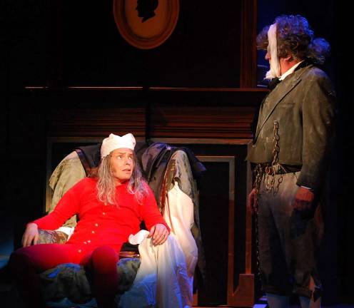 Pictured from left: Osborn Focht as "Scrooge" and Dave Scheffler as "Marley's Ghost."
