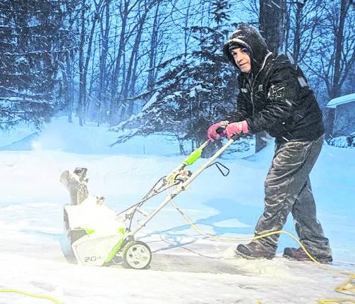 West Milford resident Jeremy Malvasia cleared off his driveway multiple times during the storm.