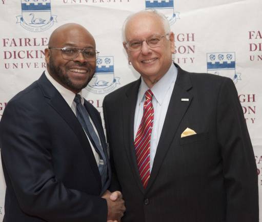 Marion McClary of Hewitt, left, is seen here with Fairleigh Dickinson University President Sheldon Drucker, celebrating McClary's 15 years at the university.