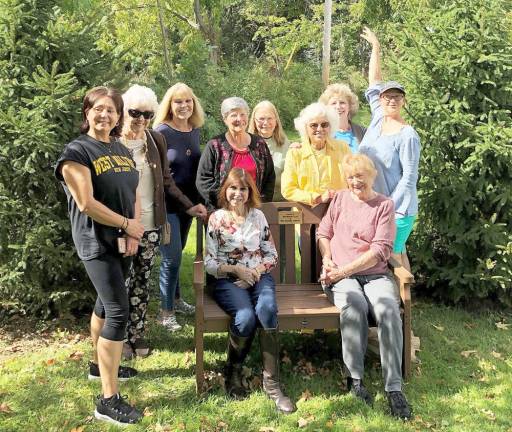 Members of the West Milford WomAn’s Club pose with the Trex bench they donated and delivered to the West Milford this past weekend. Photos provided by Pat Spirko.