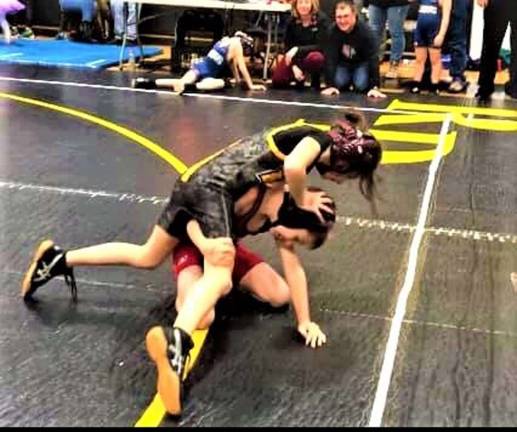 Junior wrestling team posts winning meet, 3-1
