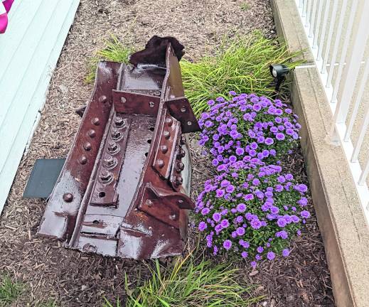 A recovered piece the World Trade Center resides on the entrance of the West Milford Museum.