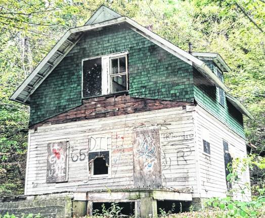 One of the last remaining homes in the once beautiful village of New City was vandalized so badly that City of Newark officials voted to demolish this building and any others left. (Photo Ann Genader)