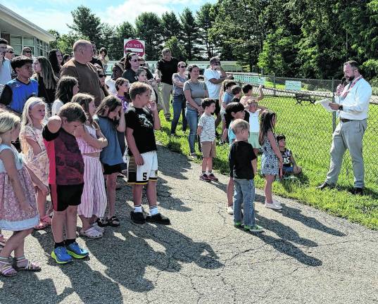 Marshall Hill principal Patrick O’Donnell talks to the crowd before the ribbon cutting.