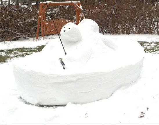 Lazy Day Fishermen, created by Katie O'Brien, took first place in the Pinecliff Snow Sculpture contest.
