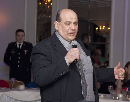 Photos by Glynnis Jones Thomas Frodella welcomes the guests at the Emmaus For Veterans banquet at Perona Farms.