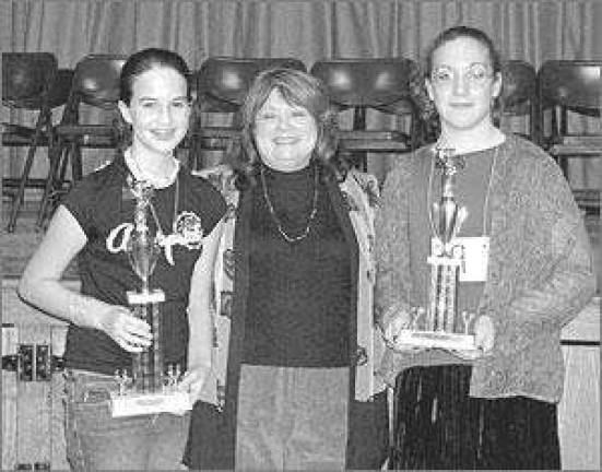 Good speller takes titles twice