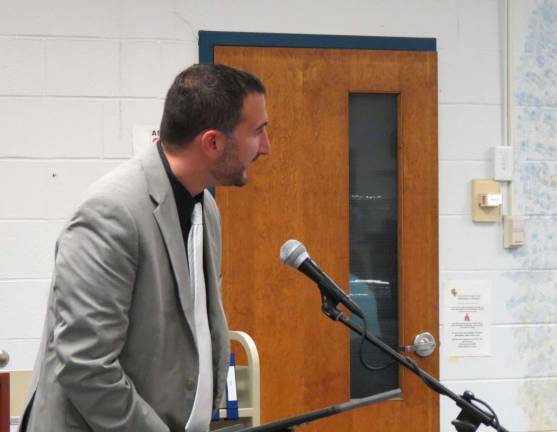 Steven Deo addressed the school board after they unanimously approved his appointment to principal of UGL.
