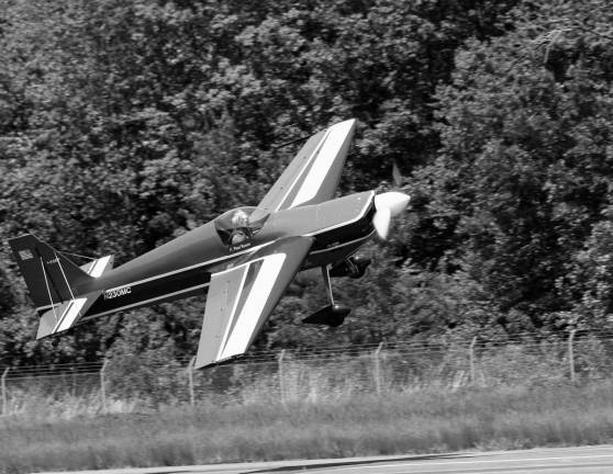 One of the 18 pilots who competed takes off for his shot at the Skylands Aerobatic Championship.