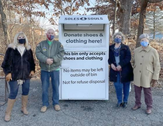 The Woman’s Club of West Milford is actively collecting slightly used shoes. Pictured are members and directors of the West Milford Woman’s Club along with the Commander of Post 289. Photo provided by Pat Spirko.