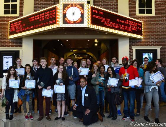 All participants at the Passaic County Film Festival stand under the marquee at the Fabian 8 Theater in Paterson.