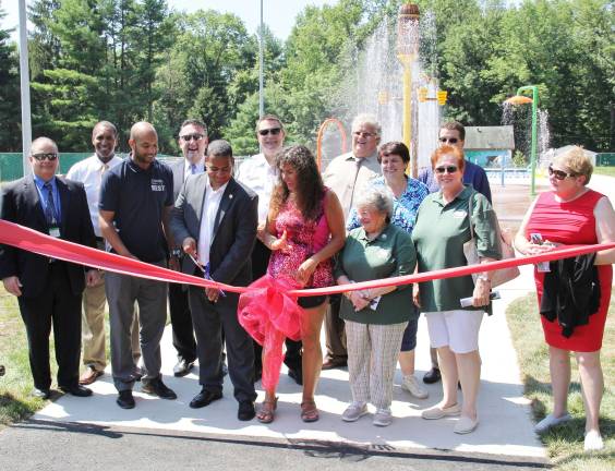 West Milford Mayor Bettina Bieri, along with Passaic County Freeholders, cut the ribbon on Camp Hope's new water park in July.
