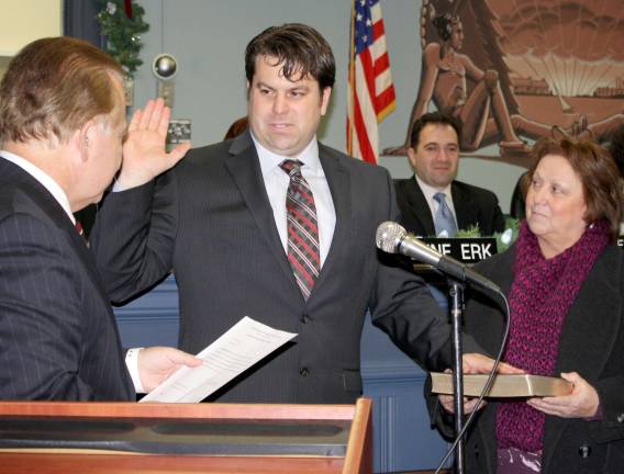 Two new council members take their oaths