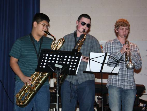 Bring on the brass. "The Statement" entertained the party goers, so much so there was not one chair turned in the direction of the game's half-time show.
