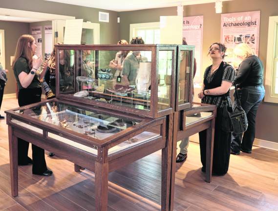 Visitors look at the exhibits.