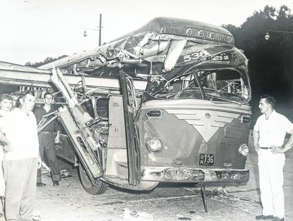 A commuter bus returning from New York City to Newfoundland struck equipment that protruded onto the traveled portion of Route 23 near the High Crest Lake entrance during a project to dualize the highway in 1953.