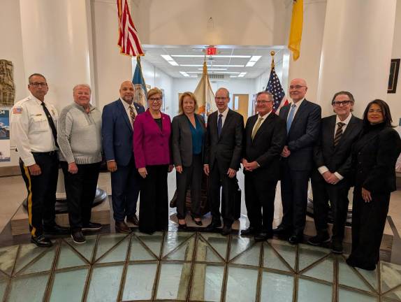 Sheriff Thomas Adamo, Passaic County Commissioner Nick Veliky, Passaic County Commissioner Deputy-Director Orlando Cruz, Congresswoman Nellie Pou, Passaic County Commissioner Director Sandi Lazzara, Chief Justice Stuart Rabner, Judge Michael Blee, Assignment Judge Rudolph Filko, retired Assignment Judge Ernest Caposela and Passaic County Surrogate Zoila Cassanova.