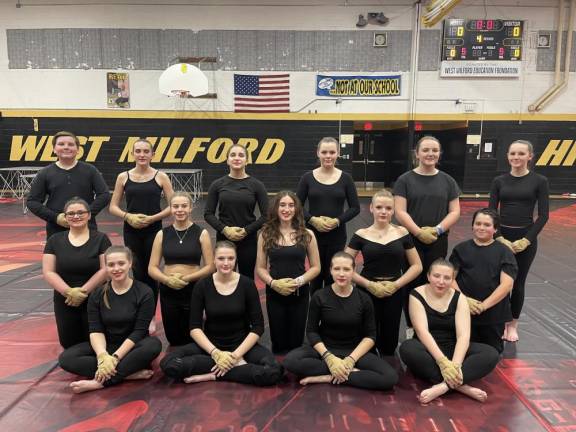 The West Milford Indoor Color Guard has 15 members. It is open to middle and high school students. (Photo by Peter Shaver)