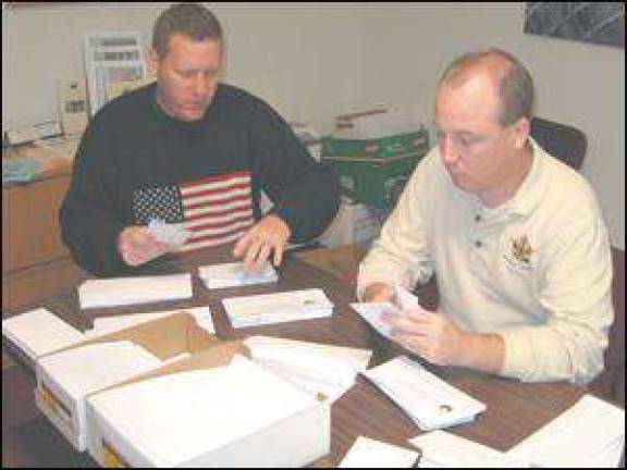 Candidates lend a hand