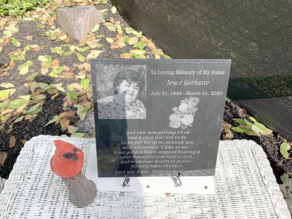A plaque, dedicated to Joyce Gerbasio, now in her memorial garden.