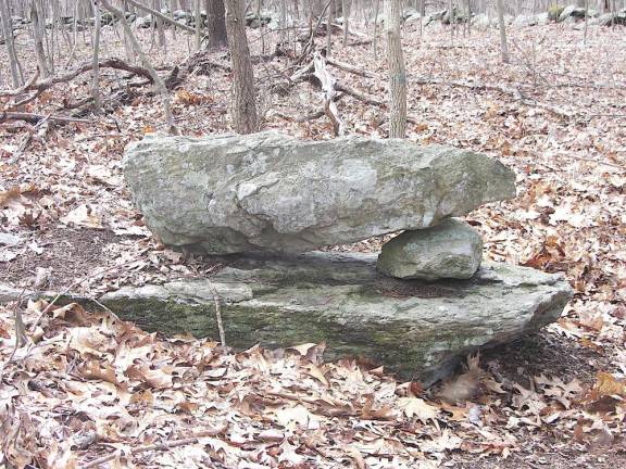 An example of a propped boulder ceremonial stone landscape, where a boulder has one side in contact with the ground or another boulder, while another side is propped up by one or more stones. This was found in the Bushkill, Pennsylvania area.