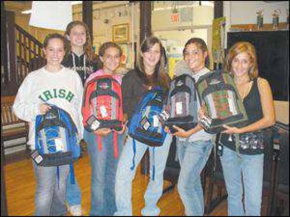 Girl Scout Troop 96 helps less fortunate students with supplies