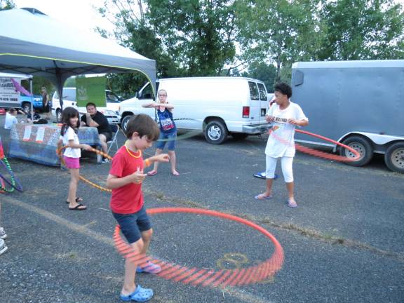 Thunder in the Highlands is a great community event. Kids enjoyed many rides and attractions, including the good old hula hoop. Photo by Patricia Keller