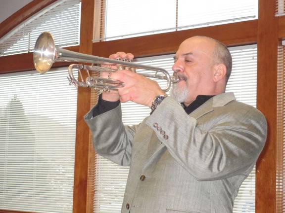 Photo by Viktoria-Leigh Wagner West Milford resident Vincent Cutro performs &quot;A Flower is a Lovesome Thing&quot; on Sunday at the Sussex-Wantage Library.