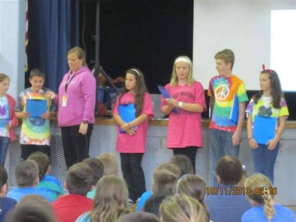 Students at Paradise Knoll read their essays about respect to the assembly.