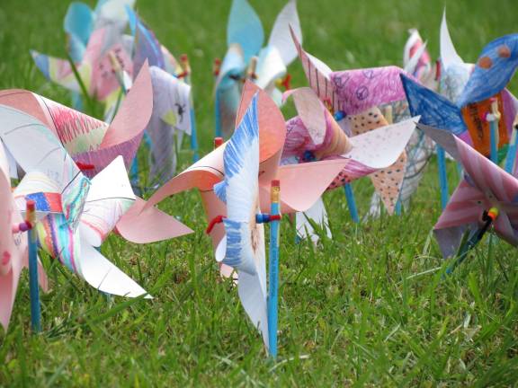Students make pinwheels for whirled peace