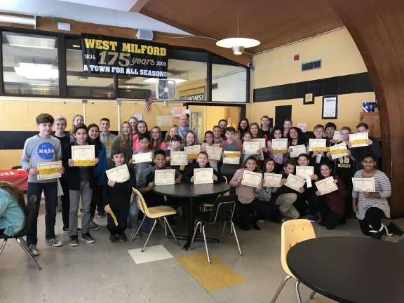 Photo provided Macopin Middle School students display their honor roll certificates.