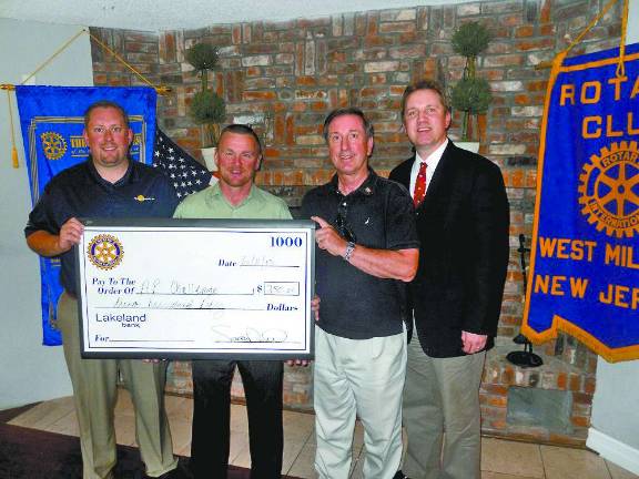 Picture here from left, are Scott Rothstein, president of the West Milford Rotary, Mark Mickens, guest speaker and one of the founders of the AP Challenge, Rotary member Gary Threlfall and Rotary member and West Milford High School Principal Paul Gorski.