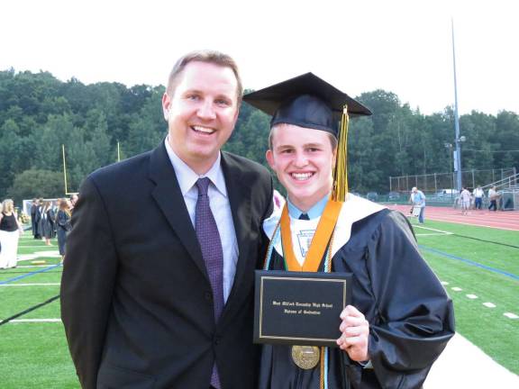 West Milford High School Principal Paul Gorski and Valedictorian Dillon Guarino are all smiles.