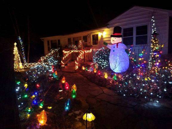 Photo Provided Folks will be lighting up their homes in West Milford for a chance at winning $500 in a contest sponsored by the Highlands Economic Development and Tourism Corp.