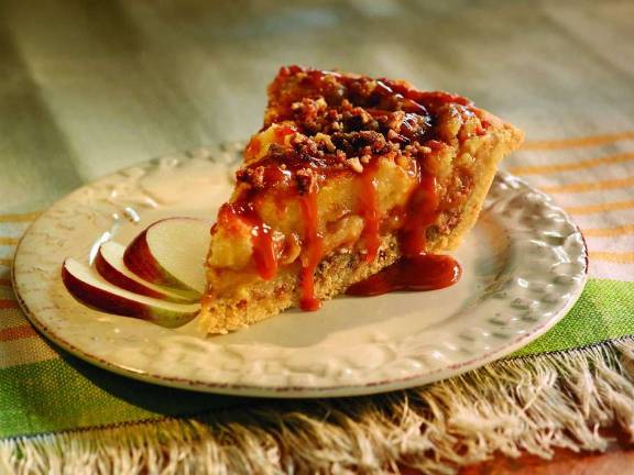 Photo courtesy American Pie Council Linda Hundt of DeWitt, Mich. won the 2011 American Pie Council Crisco National Pie Championships for her sticky toffee pudding apple pie.
