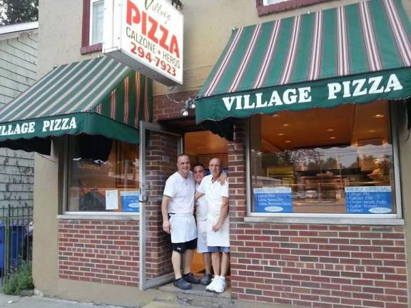 Three generations of Village Pizza: Jon-Paul, Jon-Paul Jr. and Sal Brancato.