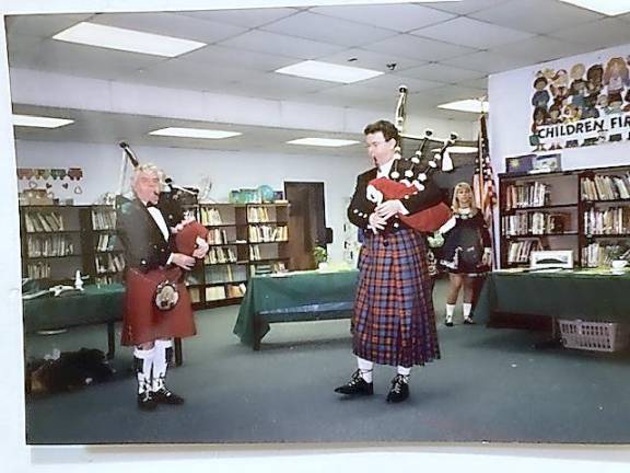 Playing the bagpipes was demonstrated by Clan Na Vale members in 2001.