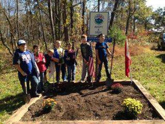 Cubs take care of the planet, learn about crime prevention