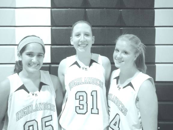 Photo by Rachael Janz From left, West Milford Highlander captains on the basketball court are Tina Lokai, Marie Ambrose and Vic Torp.