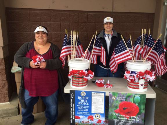 Photo by Don Webb/Spider Webb Photography Jamie Murphy, left, and Carla Trivisani are both proud members of West Milford's American Legion Auxiliary Post 289 and will be selling poppies to benefit veterans this weekend for Memorial Day.