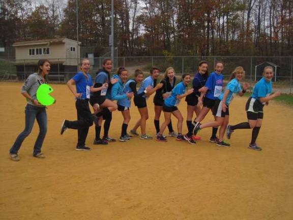 The girls work hard and they play hard. Coach has competition days a few times each season. For the Halloween competition last year, this team was the Pac Man team.
